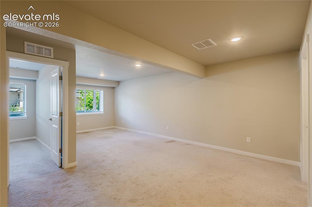 Image 12 of 21: Basement Living Area