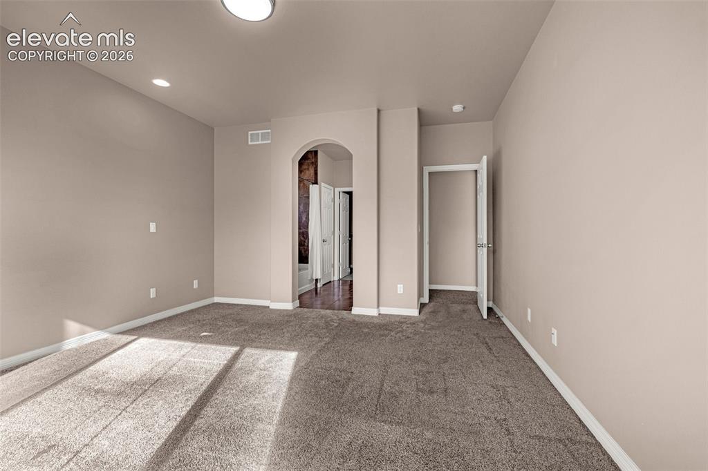 Image 12 of 39: Master Bedroom