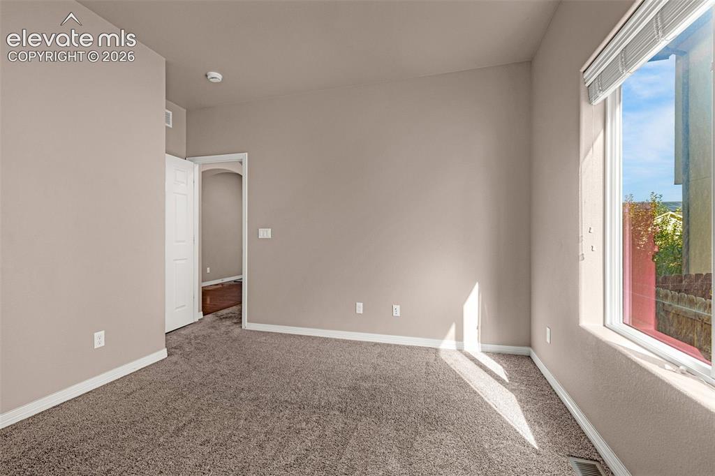 Image 18 of 39: 3rd bedroom - main level
