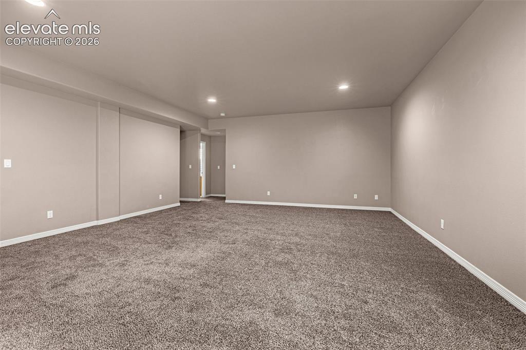 Image 22 of 39: High ceilings in basement