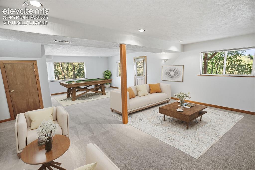 Image 16 of 42:  Lower Level Family Room - Virtually Staged