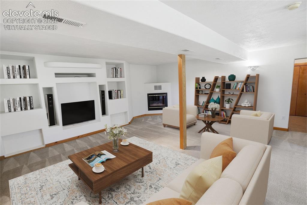 Image 17 of 42:  Lower Level Family Room - Virtually Staged