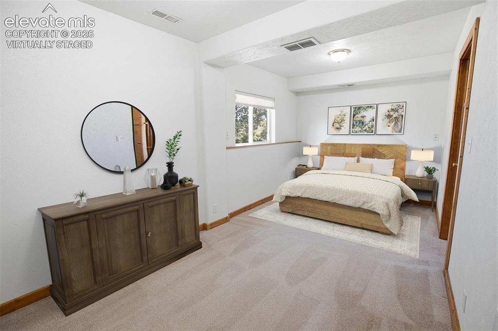 Image 18 of 42:  Lower Level Family Room - Virtually Staged