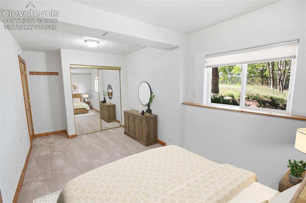 Image 19 of 42: Lower Level Bedroom 2 - Virtually Staged