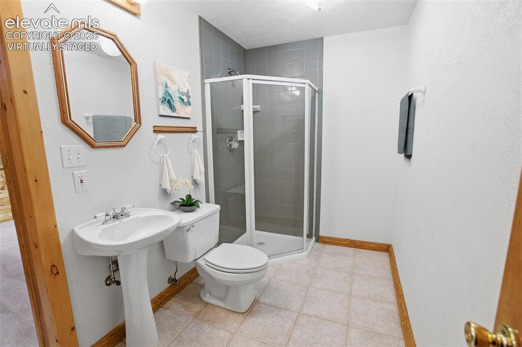 Image 20 of 42: Lower Level Bedroom 2 - Virtually Staged