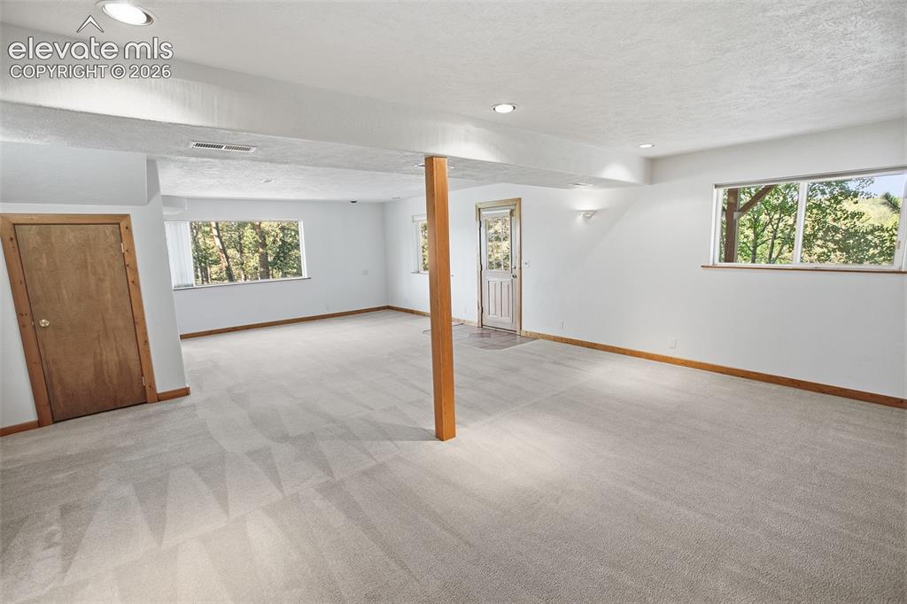 Image 37 of 42: Lower Level Family Room