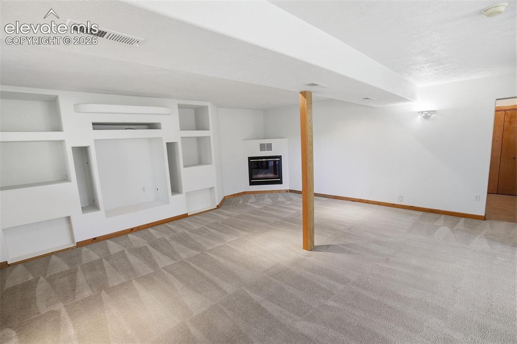 Image 38 of 42: Lower Level Family Room