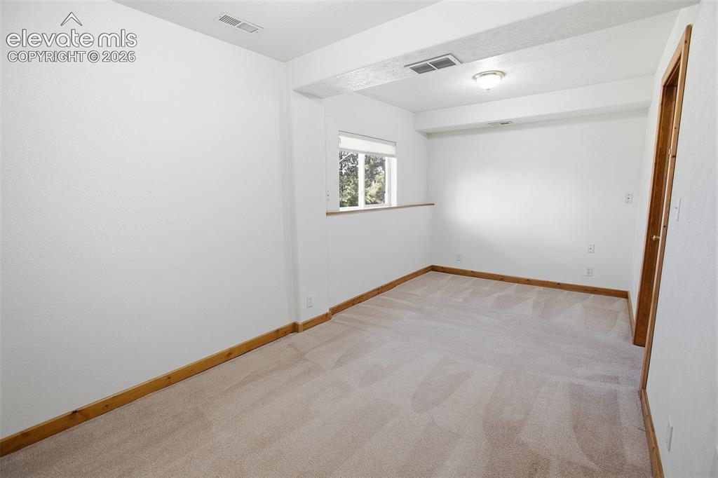 Image 39 of 42: Lower Level Family Room