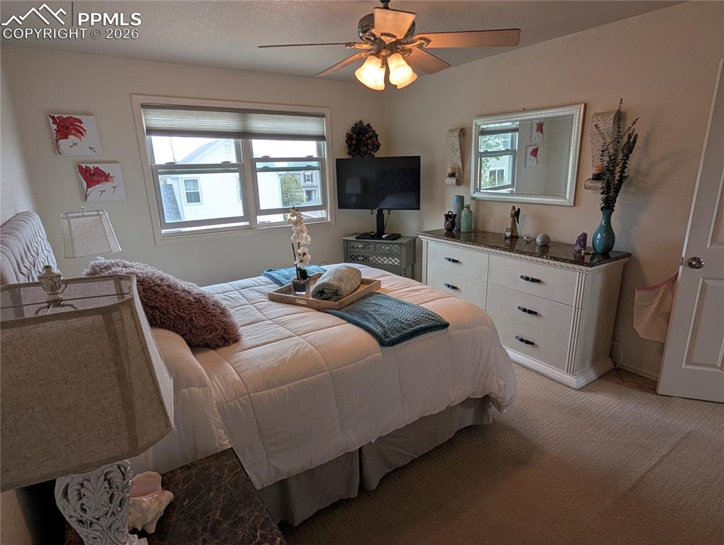 Image 13 of 30: pimary bedroom. Upgraded Anderson Windows