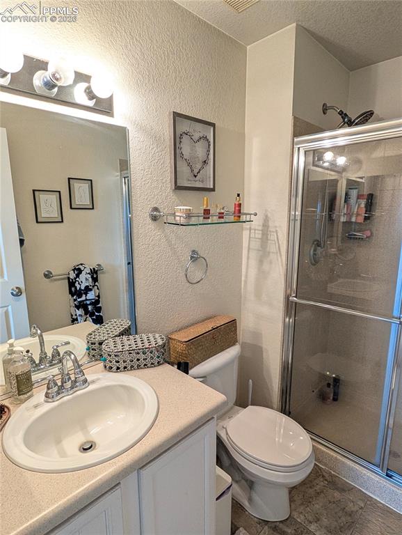 Image 14 of 30: primary bathroom with shower