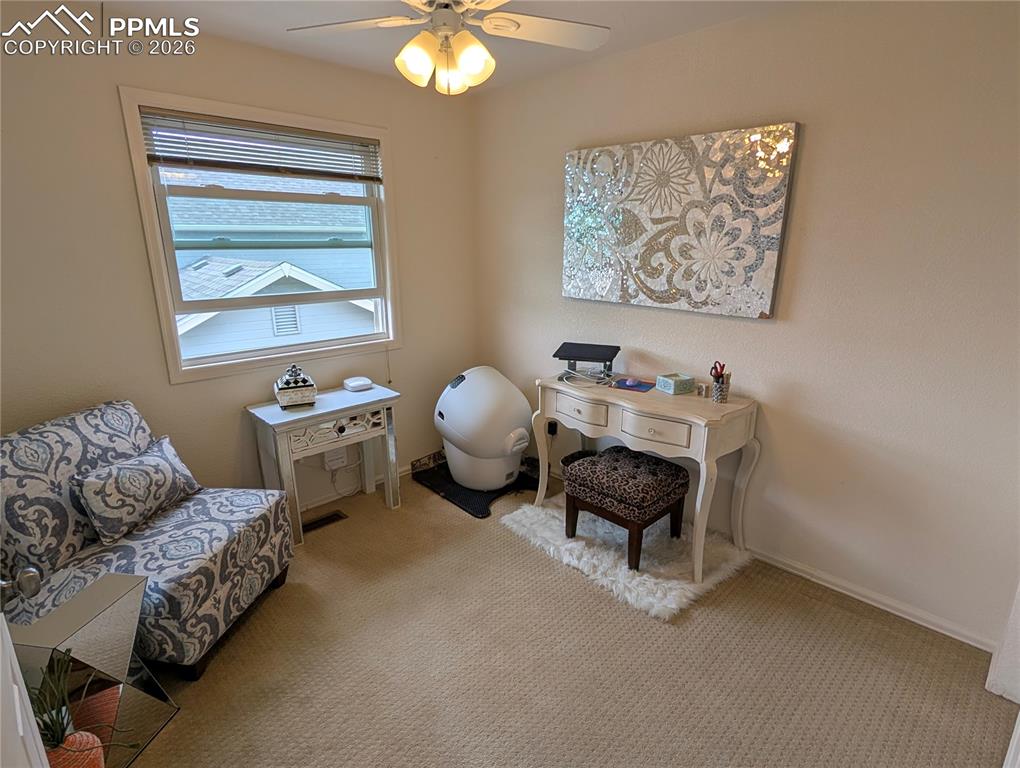 Image 16 of 30: bedroom 3 with view from upgraded Anderson window - great spot for an offic