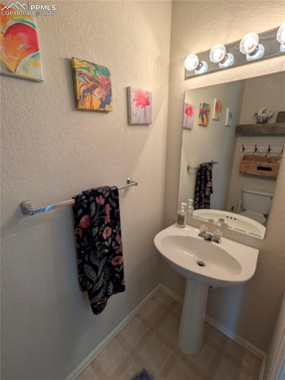 Image 19 of 30: half bath on main level