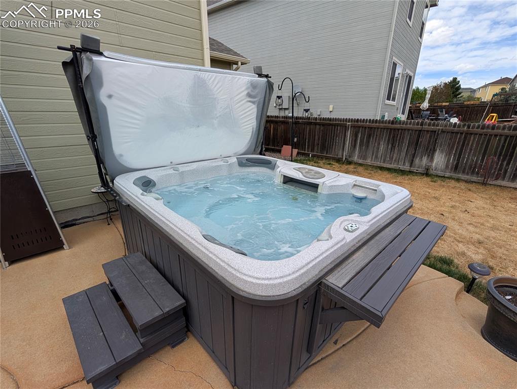 Image 21 of 30: hot tub included
