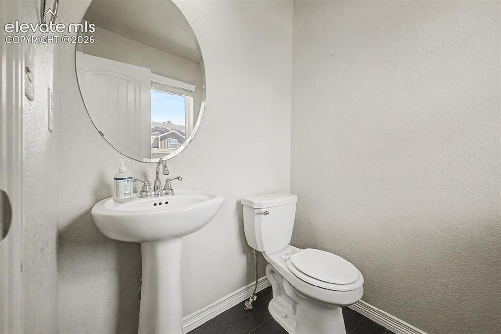Image 19 of 39: Main level powder rroom