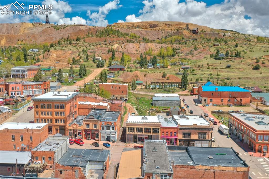 Image 31 of 34: Drone / aerial view of a mountain backdrop