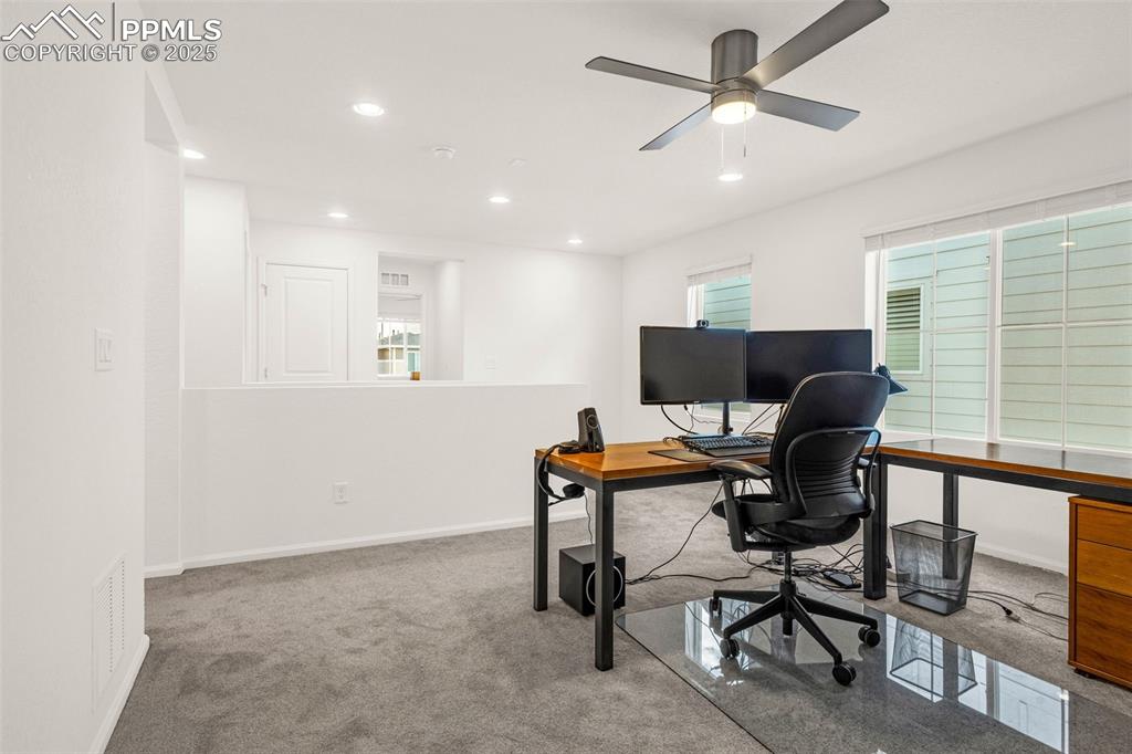 Image 16 of 38: Home office featuring carpet, ceiling fan, recessed lighting, and baseboard