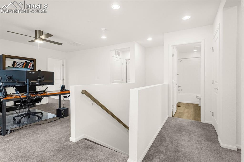Image 19 of 38: Office with carpet, recessed lighting, baseboards, and a ceiling fan
