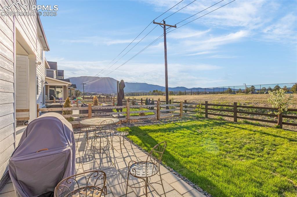 Image 30 of 38: View of yard with a mountain view and a view of rural / pastoral area
