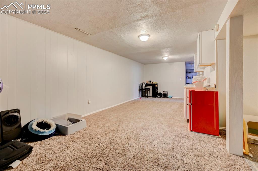 Image 19 of 30: Basement living space