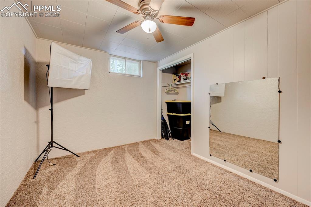 Image 21 of 30: Basement bedroom