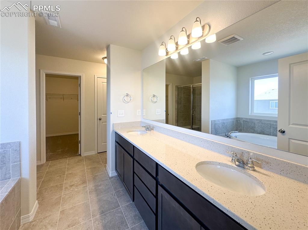 Image 19 of 46: Master Bathroom