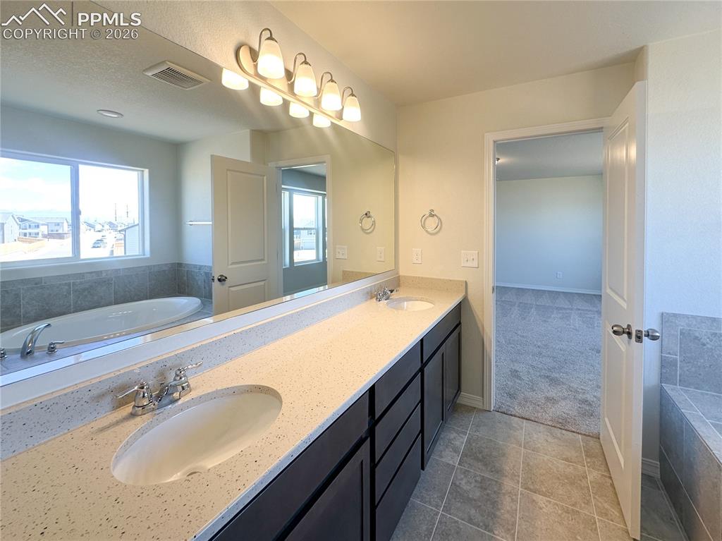 Image 22 of 46: Master Bathroom