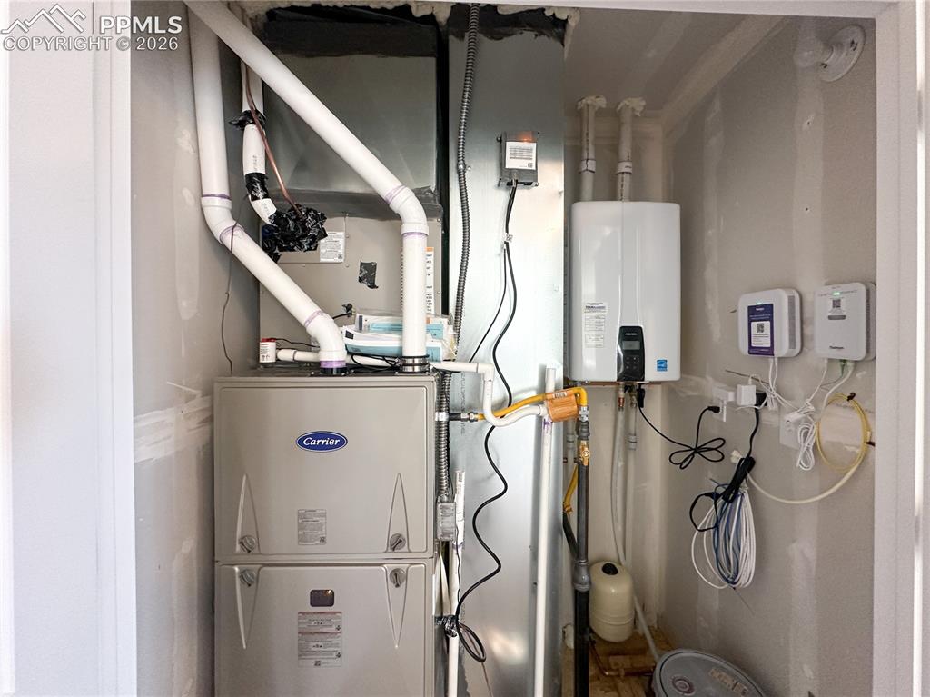 Image 46 of 46: Tankless water heater included