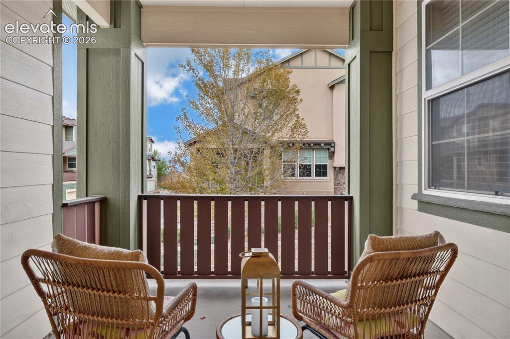 Image 16 of 43: Covered outdoor balcony 