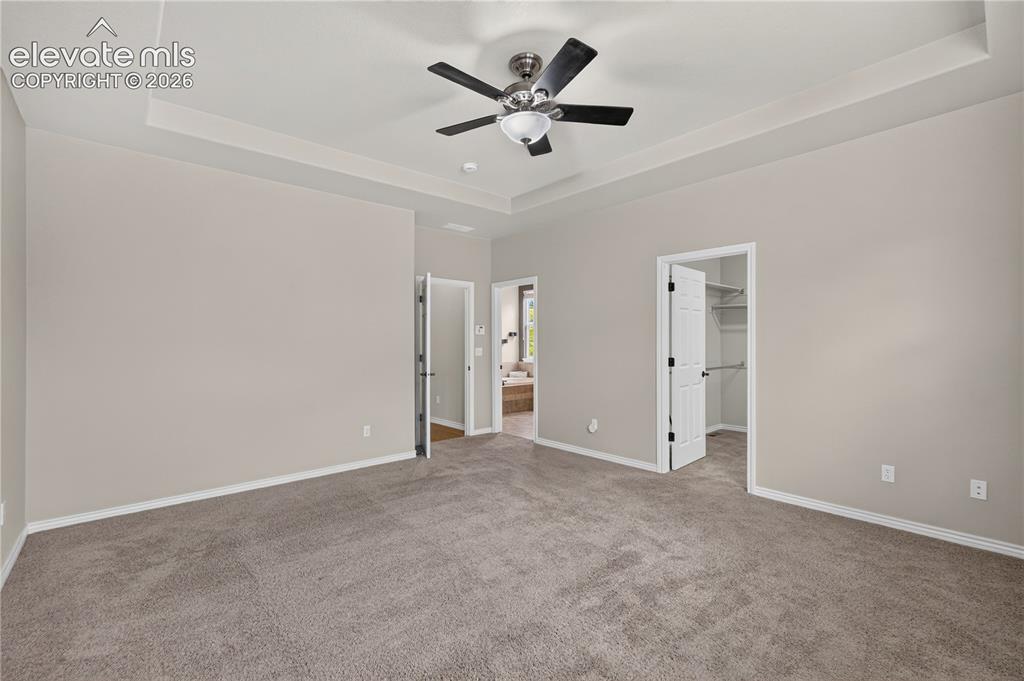 Image 27 of 43: Primary bedroom with a large walk-in closet