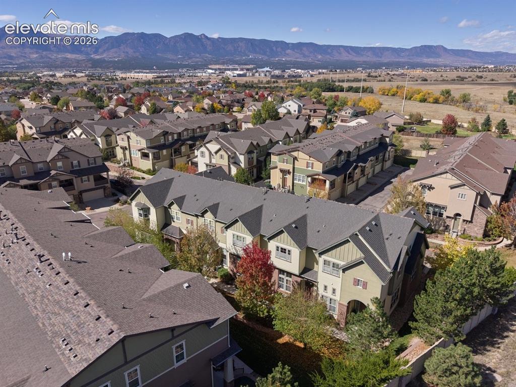 Image 42 of 43: Aerial perspective of multi-story residential structures featuring composit