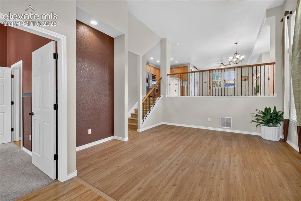 Image 8 of 43: Office and half bath just to left foyer.