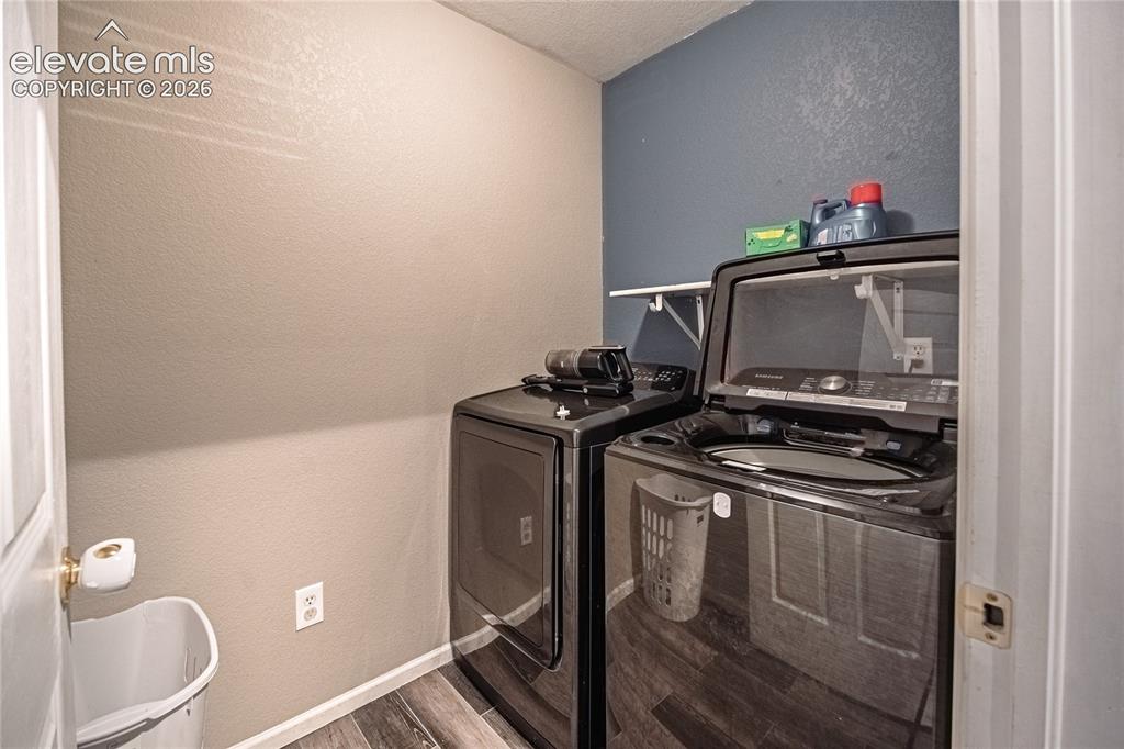 Image 18 of 28: laundry room on upper level