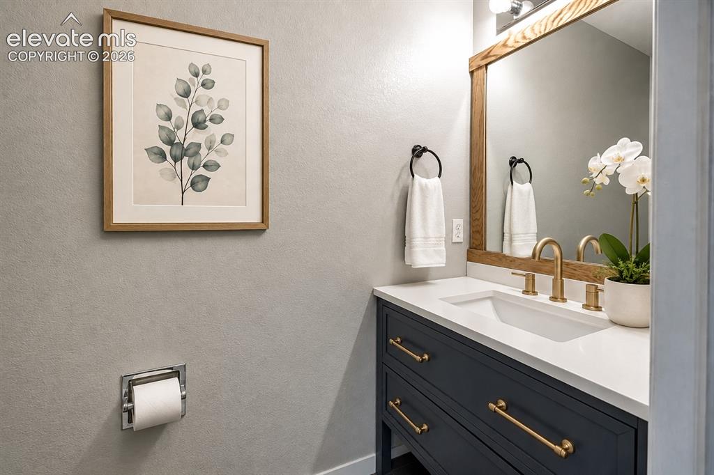 Image 8 of 28: main level half bath