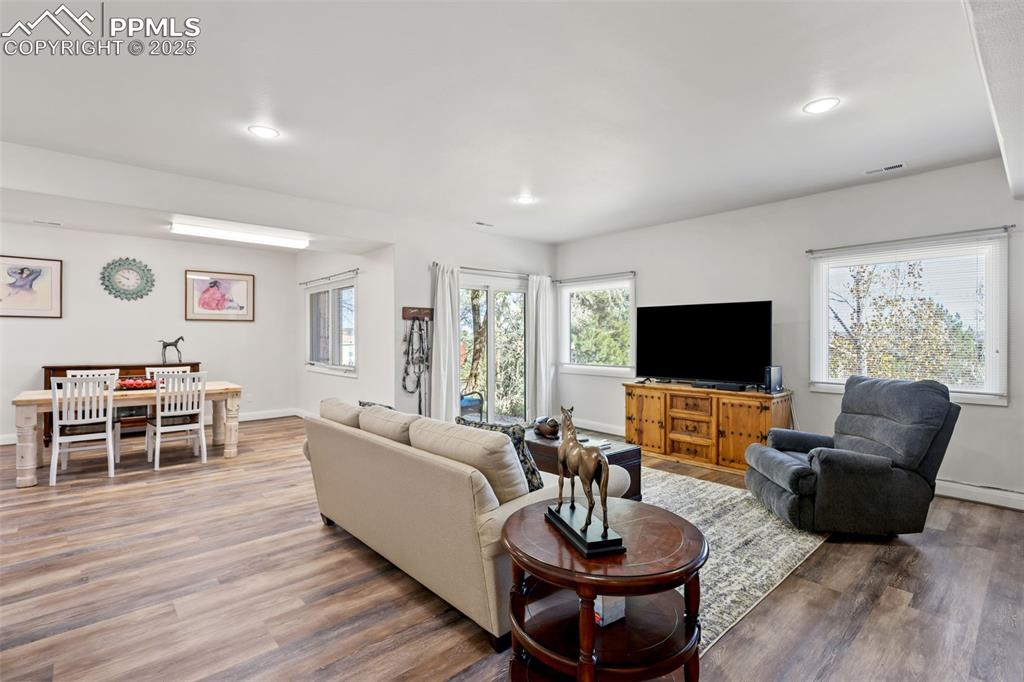 Image 24 of 37: Walk-out from family room to covered patio