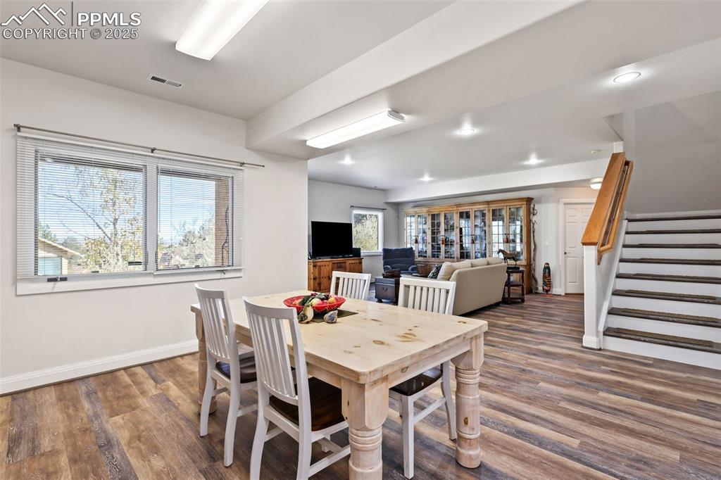 Image 27 of 37: Lower level is set up for a separate living space