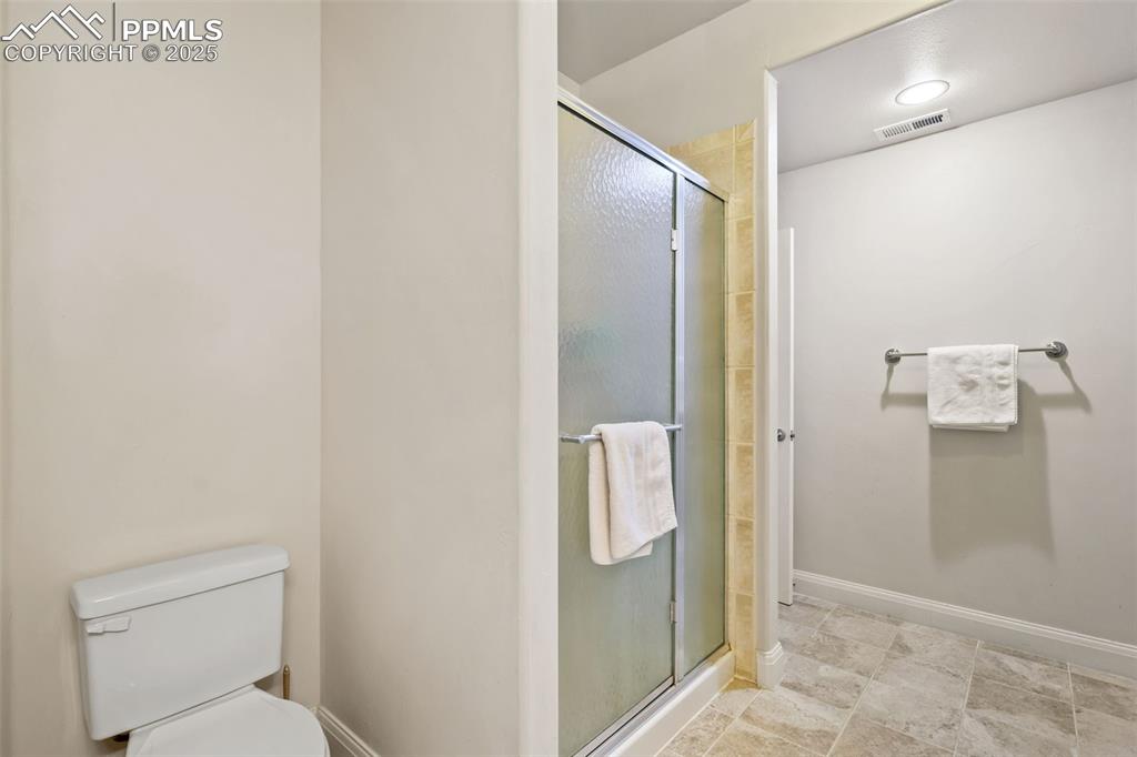 Image 31 of 37: Basement bath with shower