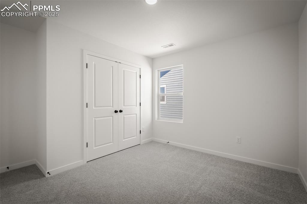 Image 24 of 31: Bedroom