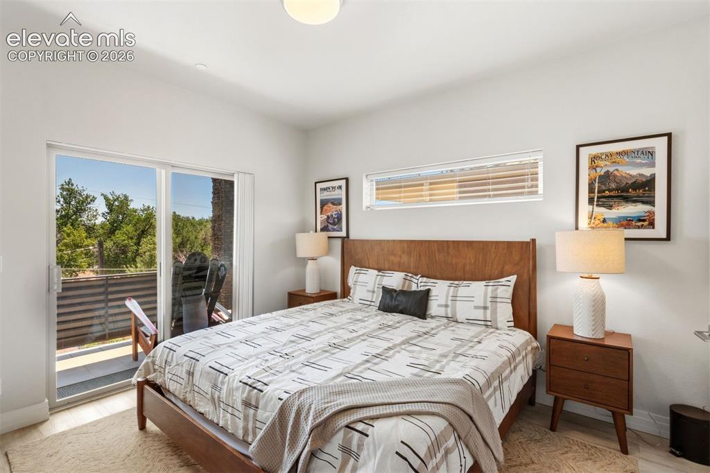 Image 4 of 43: Primary bedroom with ensuite bath and walk in closet