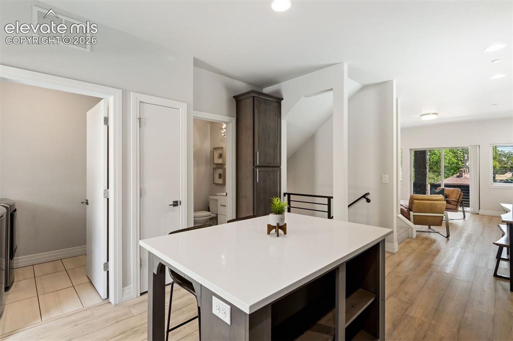 Image 9 of 43: Kitchen with walk out access to back yard
