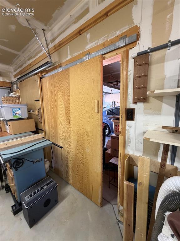 Image 34 of 46: Door to close off from other two bays