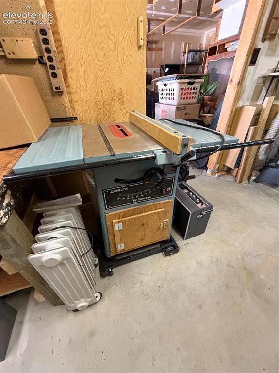 Image 35 of 46: Table saw and heater included 