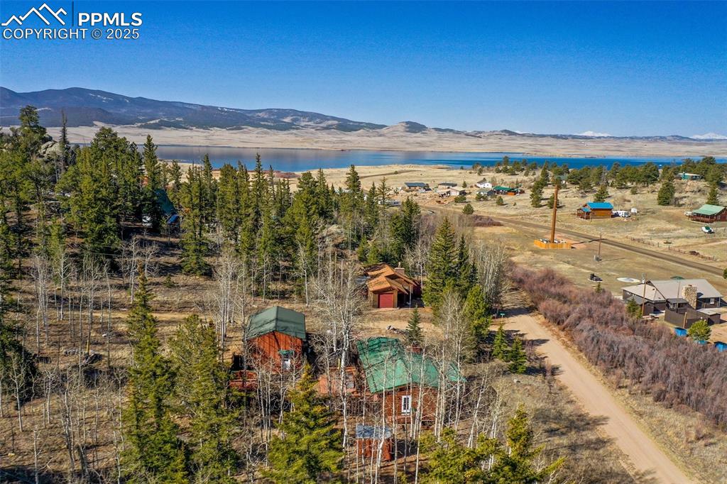 Image 29 of 38: Drone / aerial view with a water and mountain view