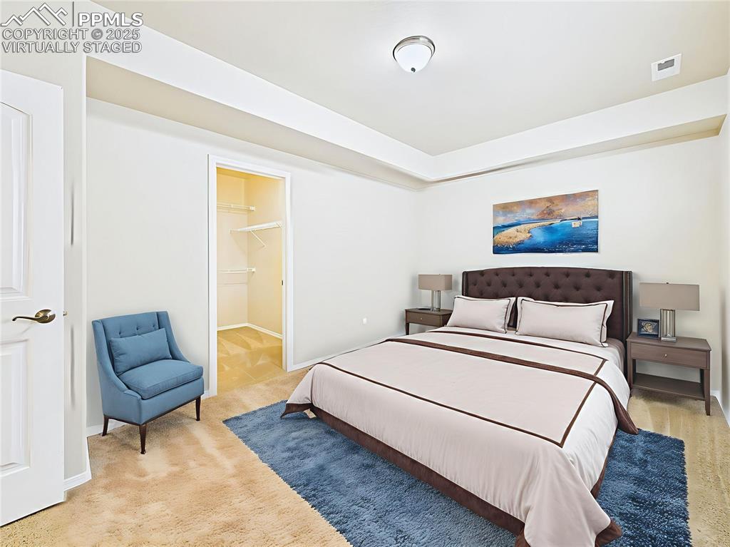 Image 35 of 50: Virtually Staged Furnished to demonstrate space for a bed and walk in close