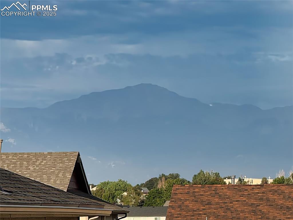 Image 40 of 50: Pikes Peak views from the rear deck — enjoy Colorado sunsets and mountain b