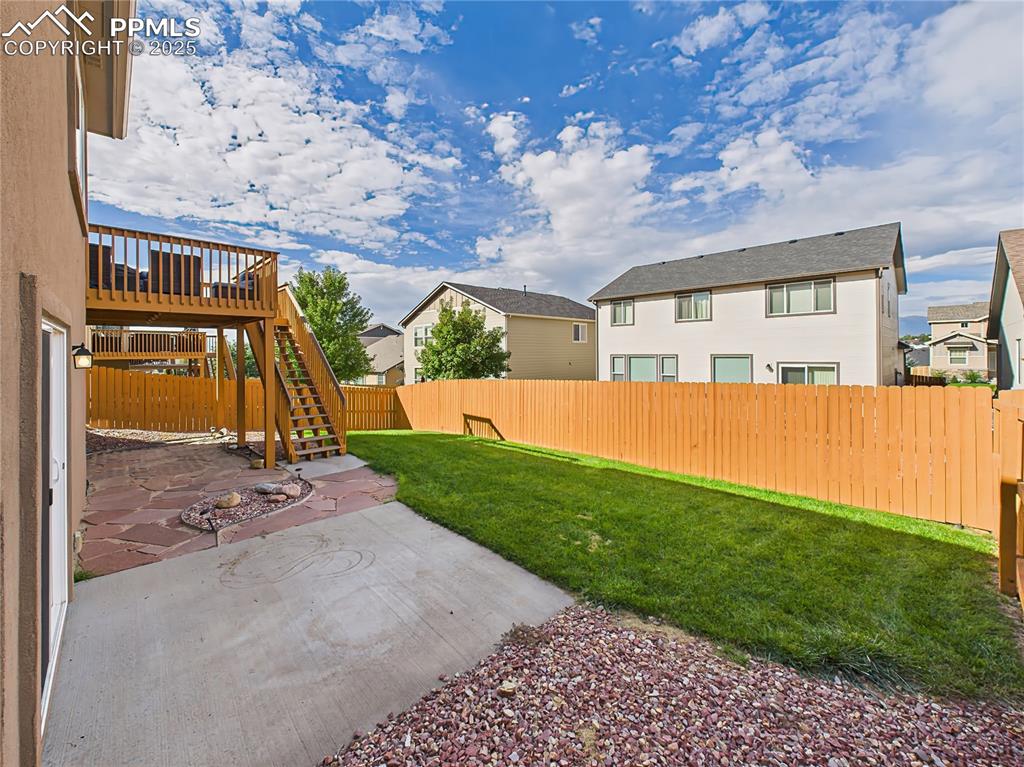 Image 46 of 50: Walk out basement with lover level patio and access to rear deck