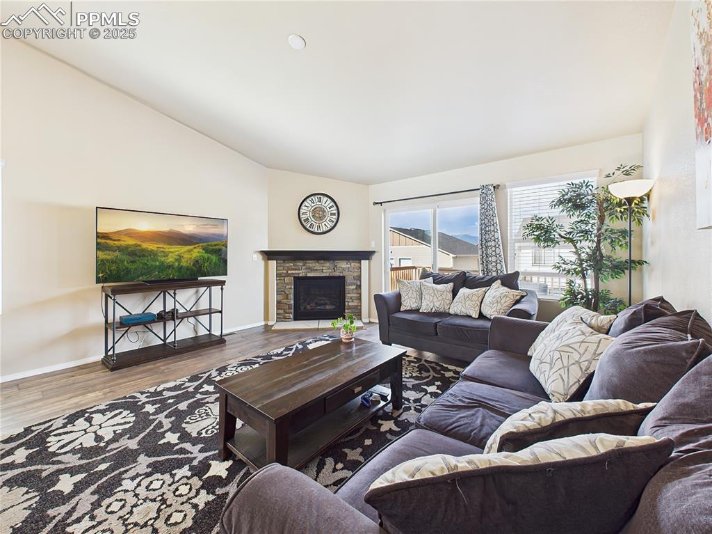 Image 8 of 50: Spacious open-concept living and dining area offers seamless flow, with upd