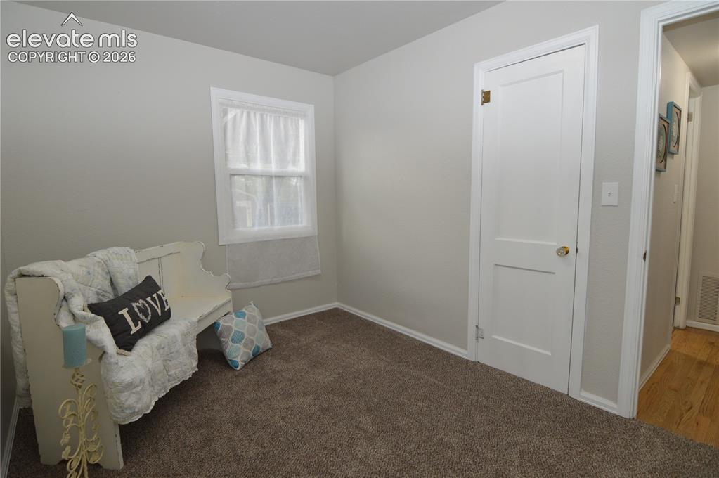 Image 19 of 23: Another look at the secondary bedroom.
