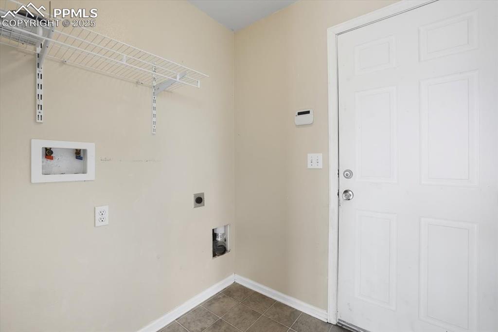 Image 14 of 44: Laundry area on the main level.