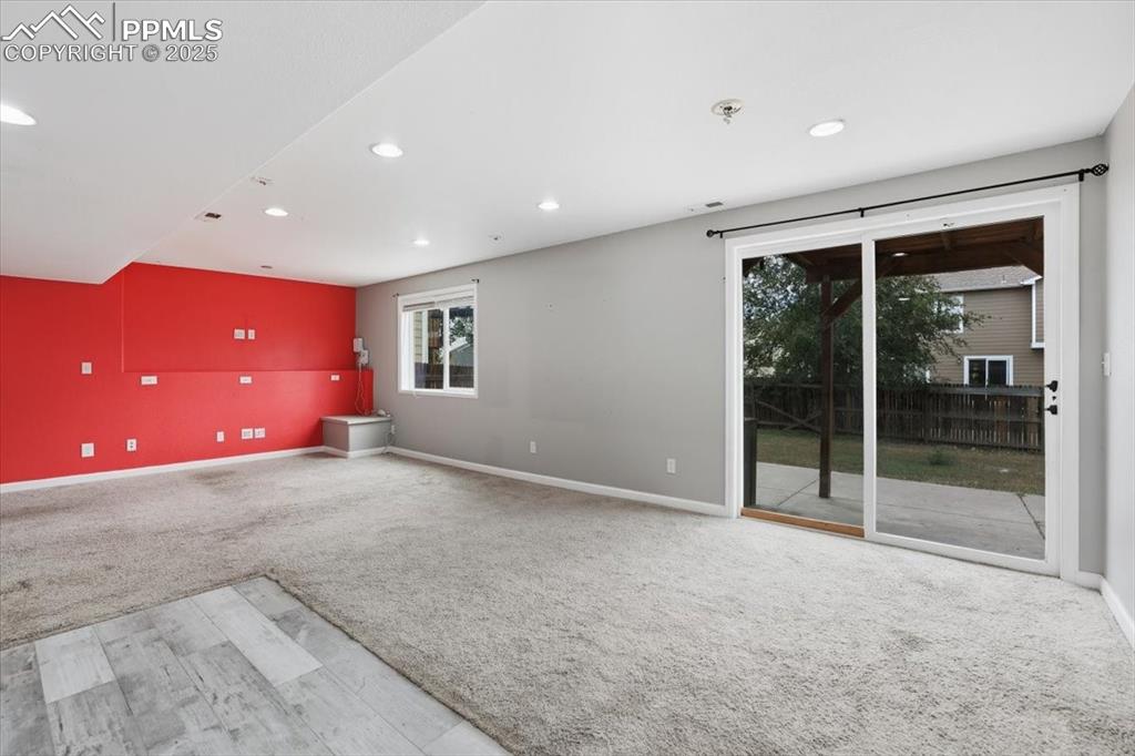 Image 27 of 44: Lower level walk-out