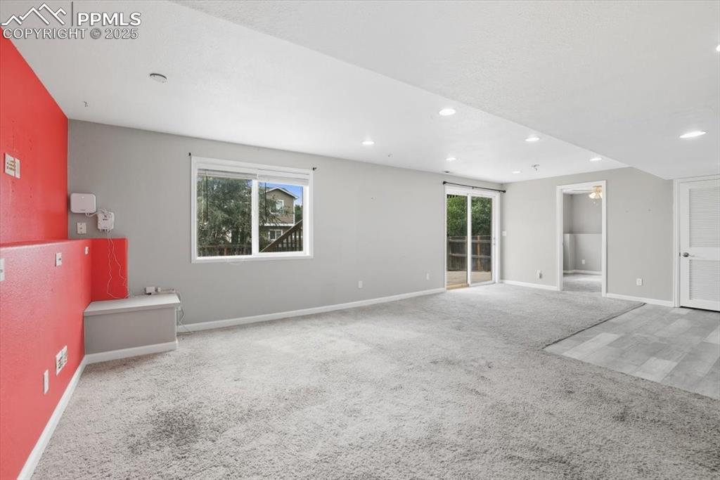 Image 28 of 44: Lower level family room.